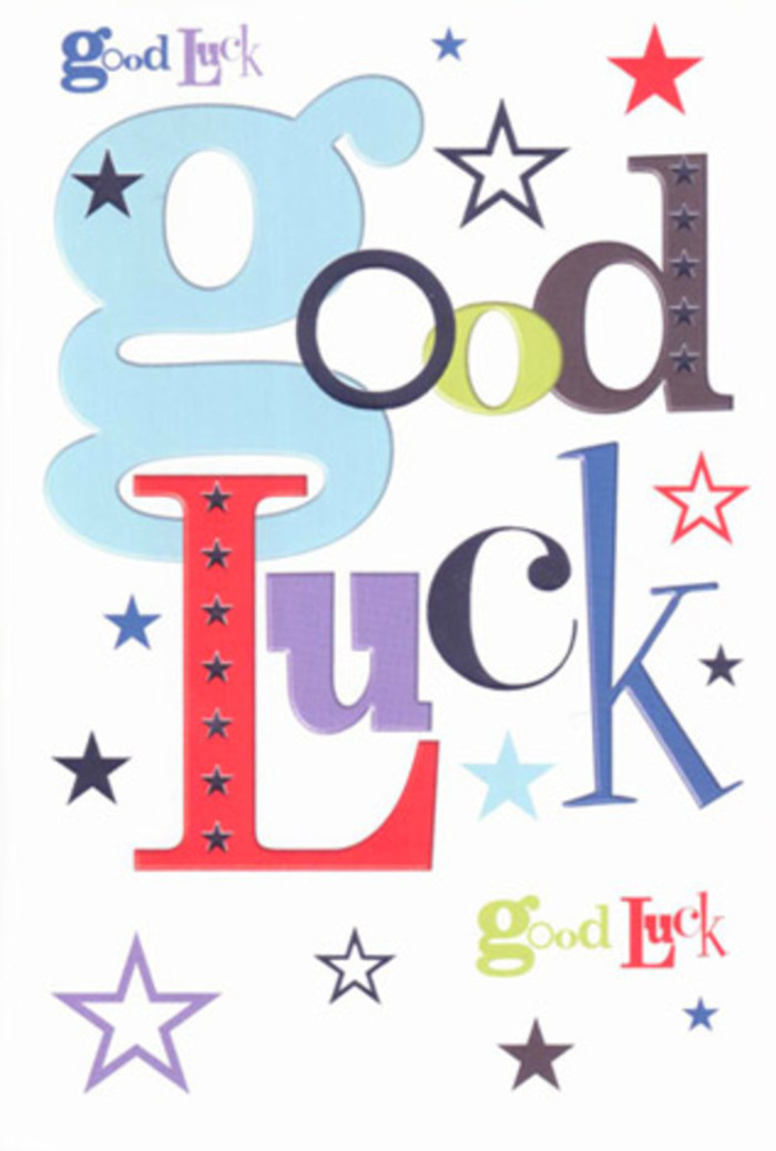 The photograph shows a single good luck card standing proudly, its design as joyful and layered as a celebratory bouquet heading out to one of the Victorian terraces around Denmark Hill. On a pure white background, the phrase Good Luck doesn't run in a neat straight line but rather bursts across the card in a staggered, free-spirited arrangement, each letter rendered in a different font that ranges from bold block capitals to slim, elegant strokes. A large, rounded pastel-blue 'g' curves gently along the bottom, like a ribbon loop on a gift box, while letters in rich crimson, mossy green, deep violet, charcoal black and softer sky tones dance above and beside it. Around the text, small and medium stars are scattered in every direction, coloured in navy, indigo, sky-blue, cool lavender and hints of citrusy lime, evoking the feeling of looking up at a clear night sky from the platforms near Denmark Hill station, where city lights meet open space. The card stock appears thick and smooth, with crisp printing that suggests a slight, pleasant resistance if you ran your fingertips across the letters. The lighting is gentle and even, allowing the colours to show true without glare, giving the overall composition a clean, modern look that still feels warm and human. As a florist might choose the perfect ribbon to finish a bouquet bound for a new job celebration or a first-day-of-university send-off, this card's mix of fonts and stars finishes the gesture emotionally, carrying encouragement, pride and that tender hope that luck will follow the recipient into every new room they enter.