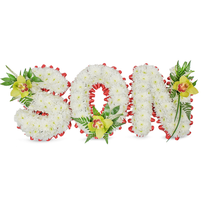 Presented against a clean white field, this memorial arrangement spells SON in fully three-dimensional letters made from a cloud of small white chrysanthemums, each bloom placed with exacting care to create an even, sculpted surface. A bright red ribbon is meticulously looped around the perimeter of each letter and threaded into the O's centre to form a scalloped outline, the vibrant red providing a bold, emotive contrast that frames the pure white blooms. Three lime-green Cymbidium orchids punctuate the design - one tucked into the S's upper left sweep, another cradled at the base of the O and the third set against the upper right arm of the N - their waxy petals and pale orange to reddish-brown throats offering a soft, intimate colour accent. Complementary greens, including long, elegant leaves and delicate fern fronds, are artfully arranged to drift upwards and around the letters, lending a sense of natural ascent and life. The chrysanthemum texture is soft and voluminous, the orchids' surfaces are polished and slightly fragrant, and the foliage is crisp, together composing a tactile harmony that reads well from both near and afar. Crafted with quiet reverence, this tribute is intended for funeral services, chapel displays or graveside placement to honour a son, and its restrained palette-white, scarlet and lime-green-speaks of purity, love and continuing memory. Locally in Denmark Hill and neighbouring lanes toward Brockwell Park and Camberwell, families often choose this style when seeking a personal, handcrafted expression of sympathy.