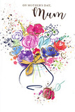 This Mother's Day card features a joyful, painterly bouquet that appears to burst from the page, much like the colourful flower stalls you might pass near Denmark Hill station. The arrangement is painted in loose, swirling watercolours: lush purples and deep indigos mingle with bright cerise, rosy pinks, and warm coral tones, their edges soft and fluid, as if still damp from the artist's brush. Tiny hints of blue and lavender slip between the larger blooms, adding cool, calming shadows that make the warmer colours glow more brightly. Fine threads of metallic gold outline select petals and leaves, catching imaginary light and giving the illustration a subtle, celebratory sparkle reminiscent of early evening sunlight over Ruskin Park. The blooms gather into a gently curved vase at the bottom of the image, drawn in the same relaxed style, then finished with an elegant golden bow that feels almost tangible, like ribbon you might smooth before presenting real flowers. All around the bouquet, scattered flecks of colour and little heart motifs drift outward, evoking tossed petals, shared laughter, and the excited flutter before a special delivery arrives. The crisp white background keeps the arrangement feeling airy and free, allowing each hue to sing without distraction. Created with the sensitivity of an experienced florist, this card becomes more than an illustration; it is a painted embrace, echoing the warmth, gratitude, and quiet pride that children of every age feel when they send flowers to their mum in and around Denmark Hill.